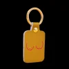 Porte-clés Boobs en cuir - Moutarde